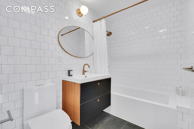 full bath with tile walls, shower / bath combo with shower curtain, toilet, tile patterned floors, and vanity