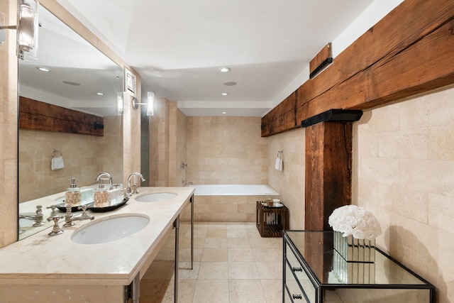 62 Beach St Tha, Unit Tha, New York City, NY 10013 - bathroom with tile walls, a garden tub, double vanity, recessed lighting, and tile patterned floors