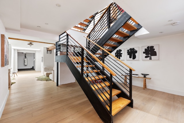 62 Beach St Tha, Unit Tha, New York City, NY 10013 - stairway featuring wood finished floors and baseboards