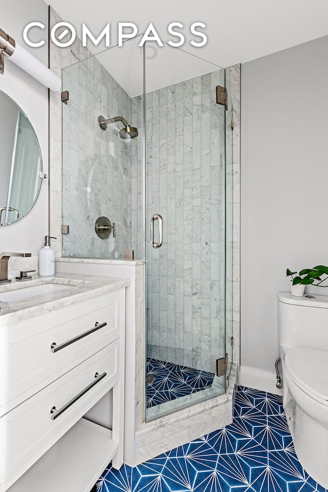 330 Bergen St Unit 3D, New York City, NY 11217 - full bath featuring a stall shower, toilet, vanity, and baseboards