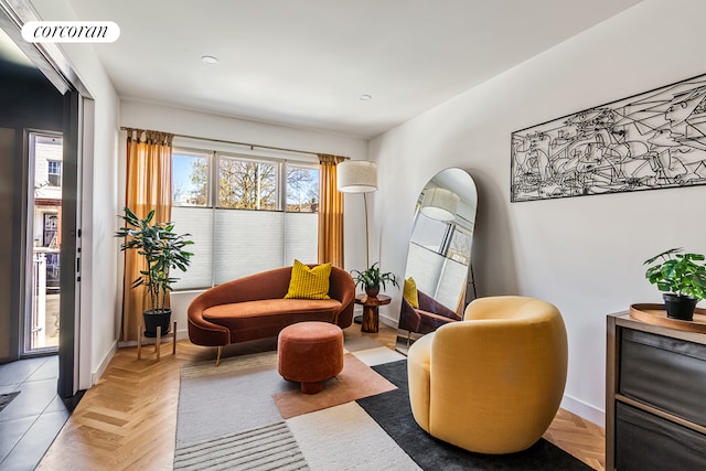 sitting room with recessed lighting and baseboards