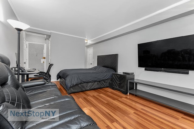 310 E 49th St Unit 2J, New York City, NY 10017 - bedroom featuring wood finished floors