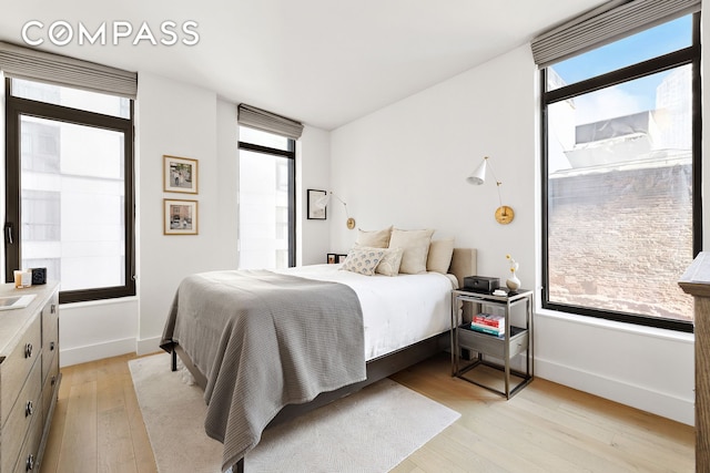 319 Schermerhorn St Unit 5D, New York City, NY 11217 - bedroom with light wood finished floors and baseboards