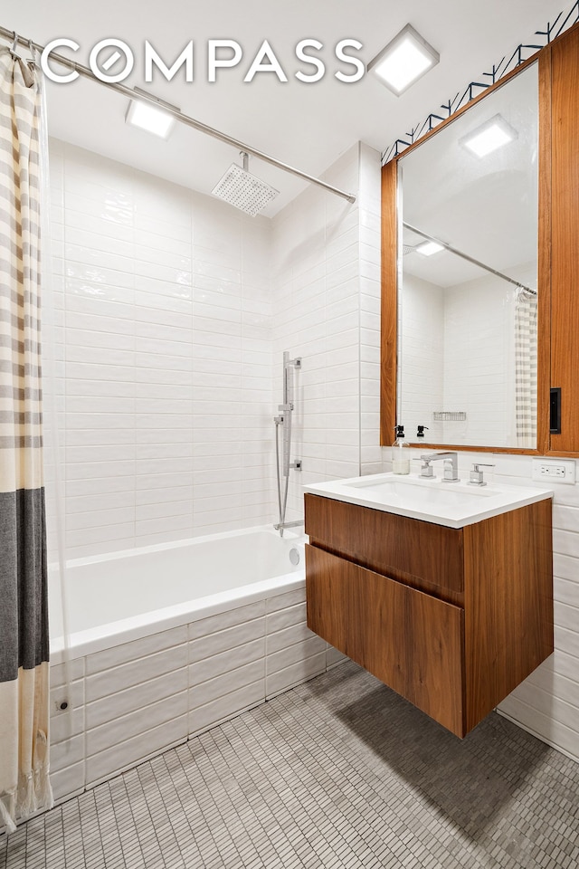319 Schermerhorn St Unit 5D, New York City, NY 11217 - full bath with tiled shower / bath, tile patterned floors, and vanity