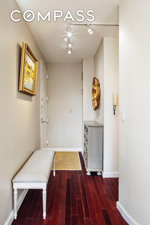 304 E 65th St Unit 10D, New York City, NY 10065 - corridor with baseboards and wood finished floors