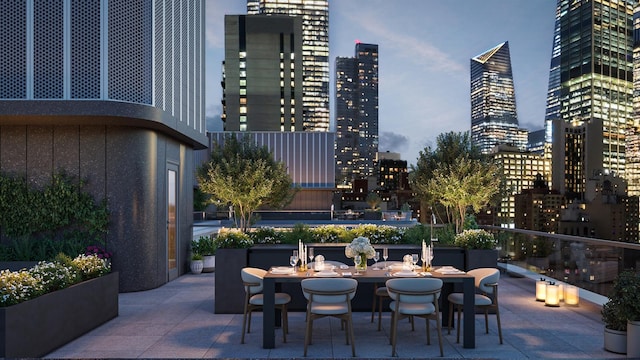 499 9th Ave Unit 9Dn, New York City, NY 10018 - view of patio / terrace featuring a skyline view and outdoor dining area