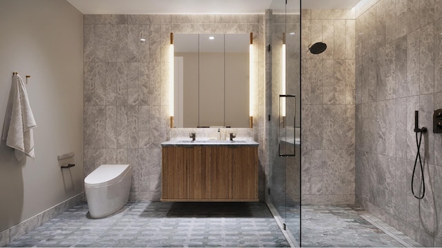 499 9th Ave Unit 9Dn, New York City, NY 10018 - full bath featuring tile walls, vanity, a stall shower, and toilet