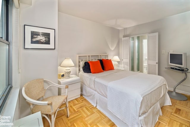 bedroom featuring baseboards