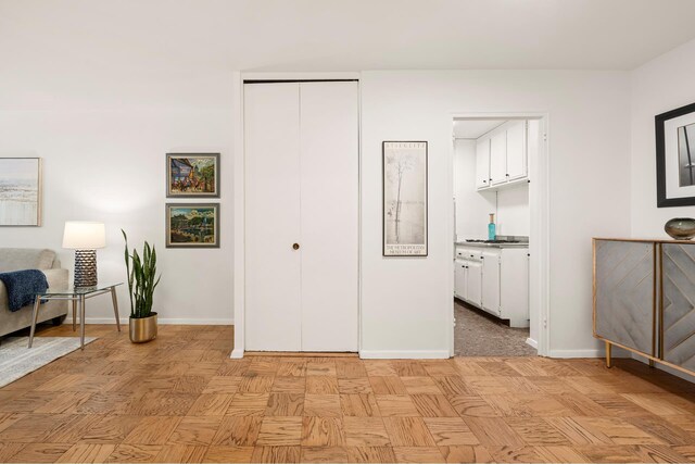 sitting room featuring baseboards