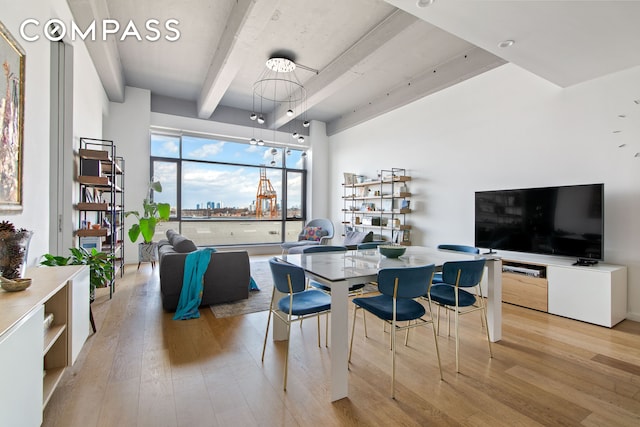 160 Imlay St Unit 4E2, New York City, NY 11231 - dining area featuring beamed ceiling and wood finished floors