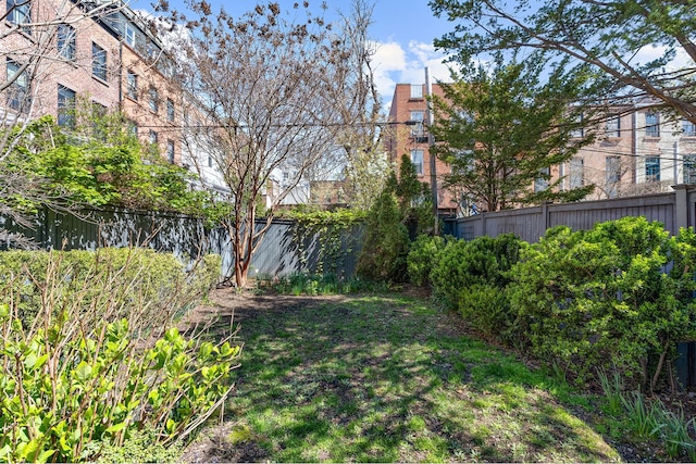 view of yard featuring fence