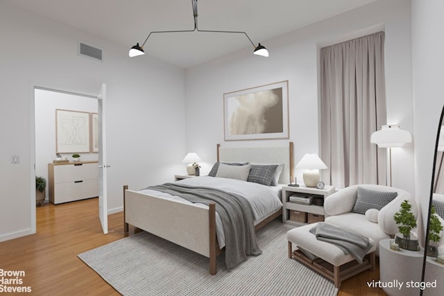 56 Pine St Unit 3B, New York City, NY 10005 - bedroom featuring wood finished floors and baseboards