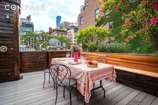 138 Lexington Ave Ph, Ph, New York City, NY 10016 - wooden terrace with a city view and outdoor dining space