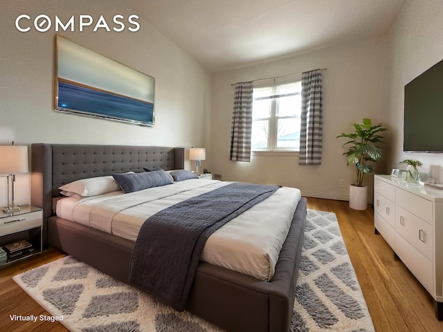 75-66 197th St, New York City, NY 11366 - bedroom featuring light wood finished floors