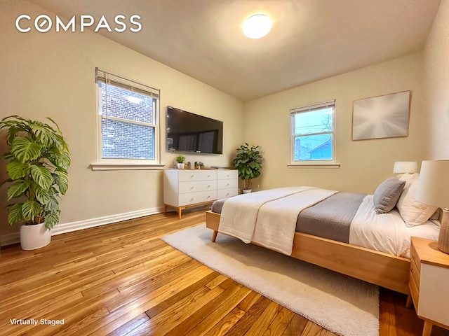 75-66 197th St, New York City, NY 11366 - bedroom featuring hardwood / wood-style flooring and baseboards