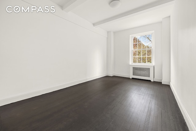 39 5th Ave Unit 2B, New York City, NY 10003 - spare room with baseboards, beamed ceiling, and dark wood-type flooring