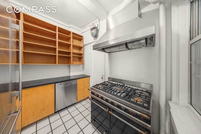 39 5th Ave Unit 2B, New York City, NY 10003 - kitchen with wall chimney range hood, open shelves, dark countertops, stainless steel appliances, and light tile patterned floors