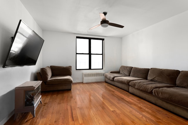 68 Stratford Rd Unit 1A, New York City, NY 11218 - living area with radiator, ceiling fan, and wood-type flooring