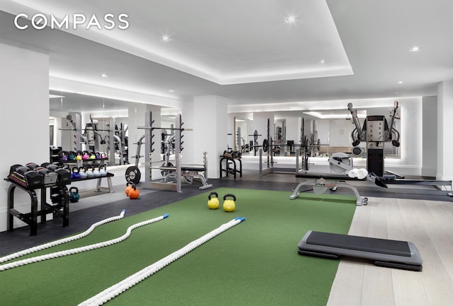 101 Wall St Unit 5Be, New York City, NY 10005 - workout area with a tray ceiling and recessed lighting