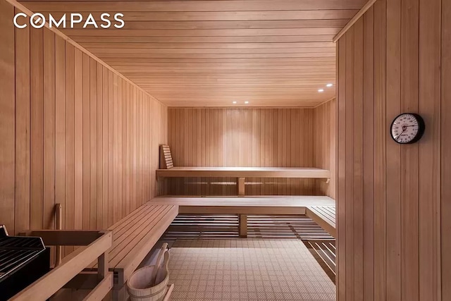 101 Wall St Unit 5Be, New York City, NY 10005 - relaxing sauna featuring wooden walls and wood ceiling