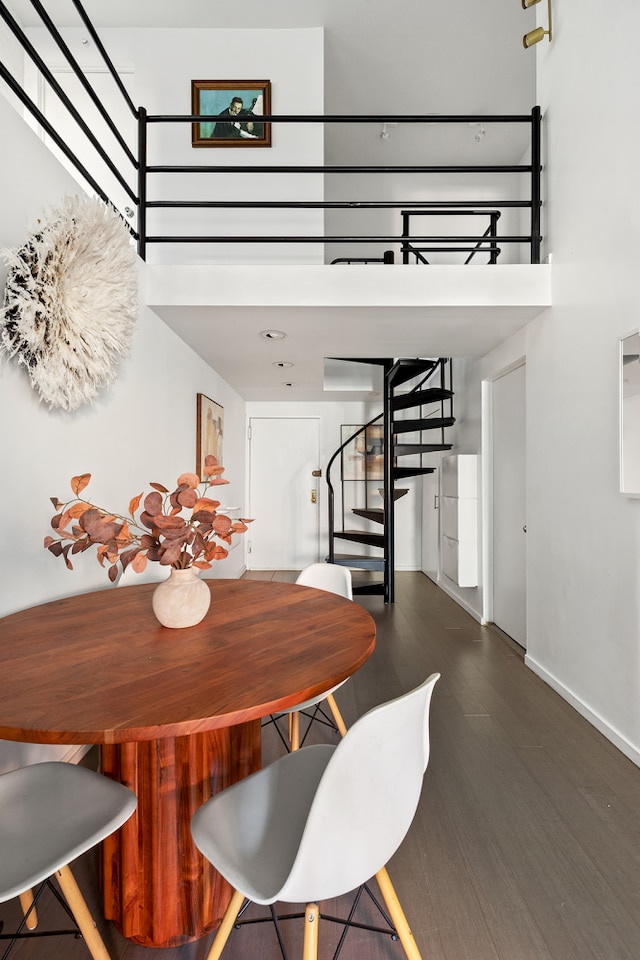 459 12th St Unit A1, New York City, NY 11215 - dining room with stairway, wood finished floors, baseboards, and a towering ceiling