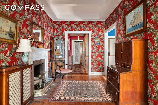 1349 Lexington Ave Unit 8C, New York City, NY 10128 - entrance foyer featuring wood finished floors, wallpapered walls, baseboards, and a brick fireplace