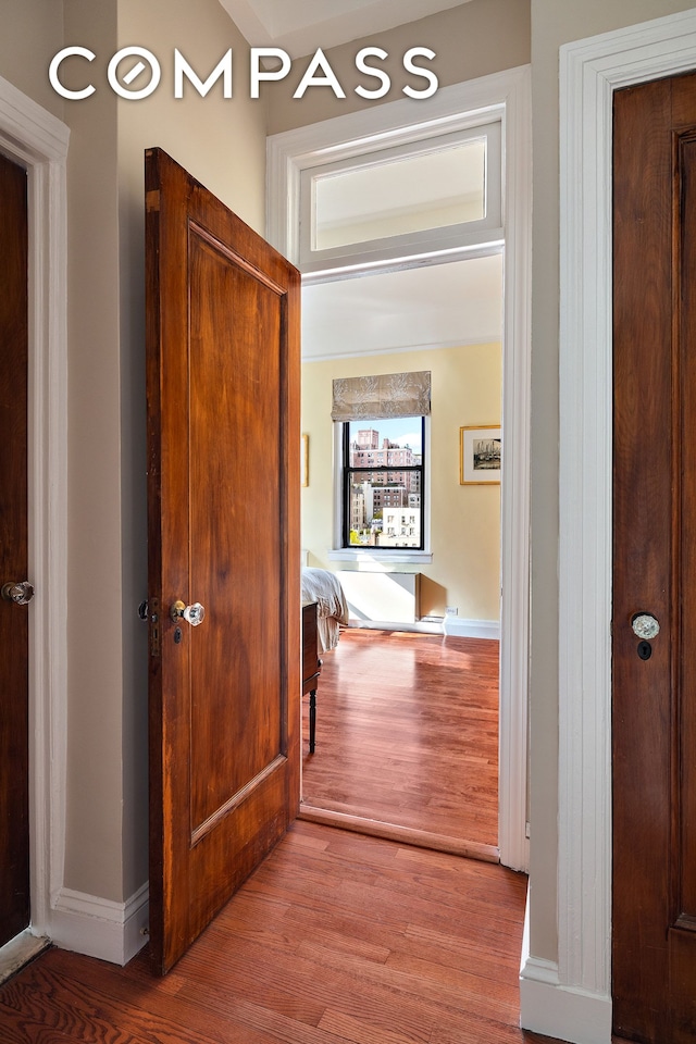 1349 Lexington Ave Unit 8C, New York City, NY 10128 - hallway with wood finished floors and baseboards