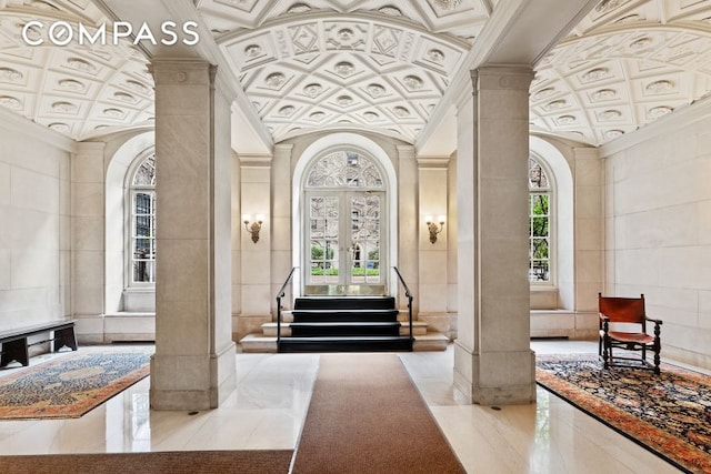 205 W 89th St Unit 6Rs, New York City, NY 10024 - community lobby featuring ornamental molding, coffered ceiling, tile walls, and stairway