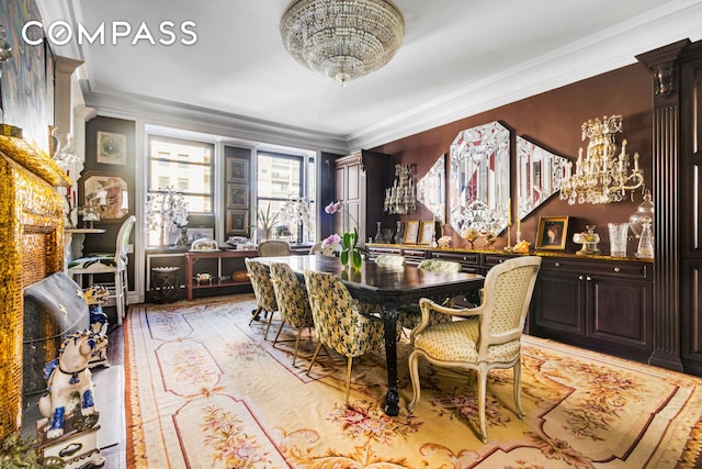 205 W 89th St Unit 6Rs, New York City, NY 10024 - dining area featuring crown molding, a chandelier, and light wood finished floors
