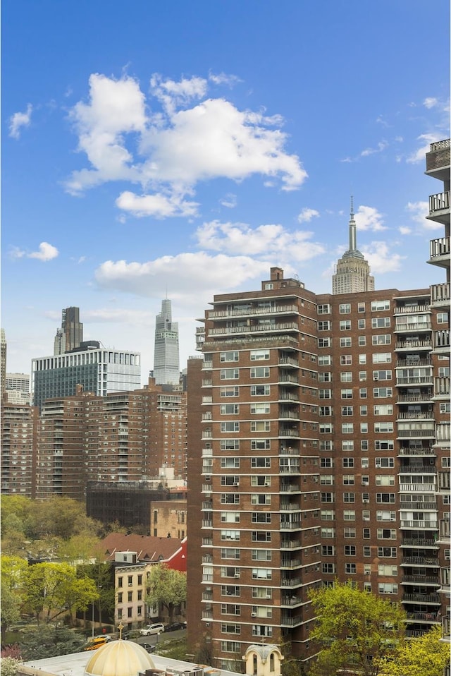 view of building exterior featuring a view of city
