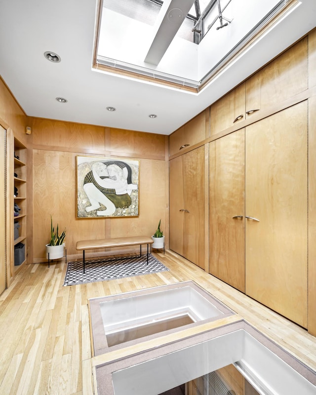 8 Charles Ln Unit A, New York City, NY 10014 - hall featuring light wood-style flooring and a skylight