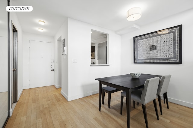 77 Bleecker St Unit 810, New York City, NY 10012 - dining room with light wood-type flooring and baseboards