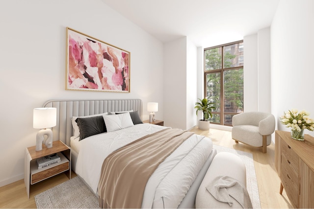 215 E 19th St Unit 2K, New York City, NY 10003 - bedroom with wood finished floors and baseboards