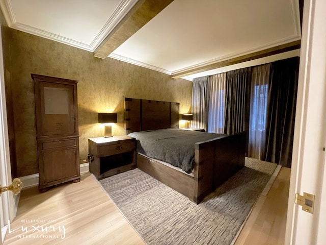 502 Park Ave Unit 12J, New York City, NY 10022 - bedroom with light wood-style flooring, ornamental molding, and baseboards