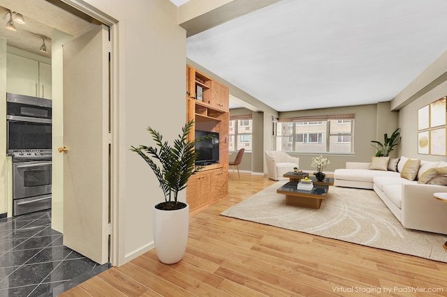 415 E 52nd St Unit 5-Mc, New York City, NY 10022 - living room with baseboards