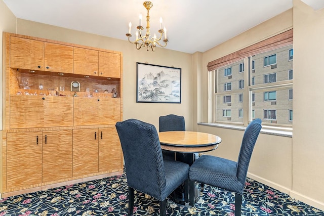 415 E 52nd St Unit 5-Mc, New York City, NY 10022 - dining room with a chandelier, baseboards, and carpet