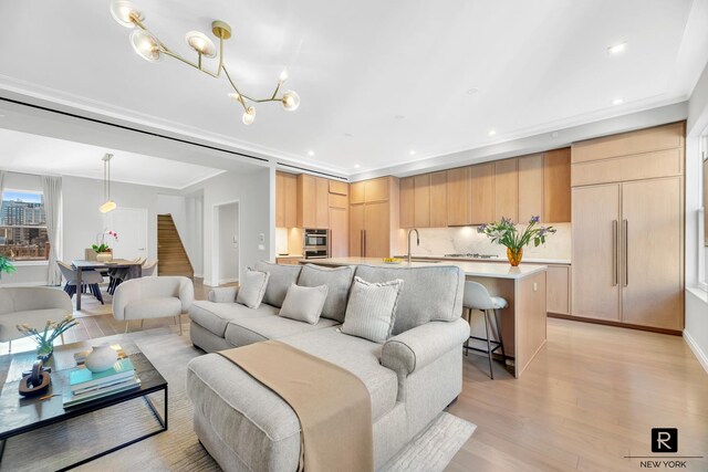350 W 71st St Ph-A, Ph-A New York City, NY 10023 - living area featuring light wood-style flooring, recessed lighting, a chandelier, and stairway