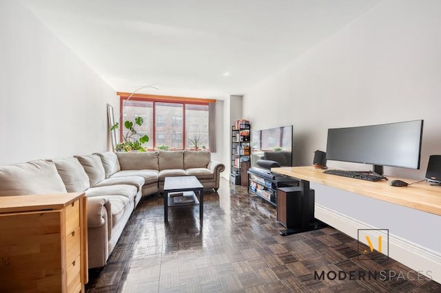 4-74 48th Ave Unit 8-M, New York City, NY 11109 - living room featuring an office area and baseboards