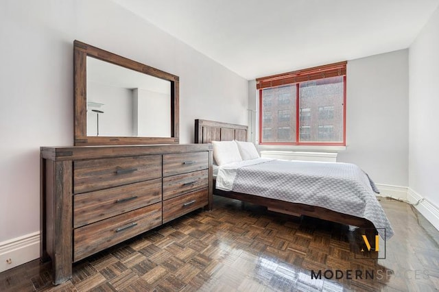 4-74 48th Ave Unit 8-M, New York City, NY 11109 - bedroom featuring baseboards