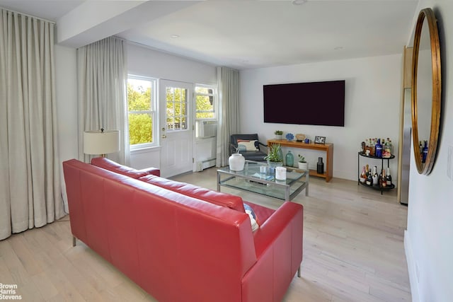 4601 Henry Hudson Pkwy Unit A7, New York City, NY 10471 - living area with baseboard heating, light wood-style flooring, and cooling unit