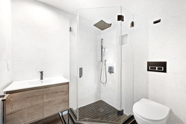 44 Box St Unit 5C, New York City, NY 11222 - bathroom featuring a shower stall, vanity, and tile walls