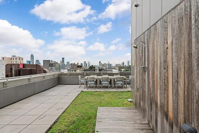 view of patio with a view of city