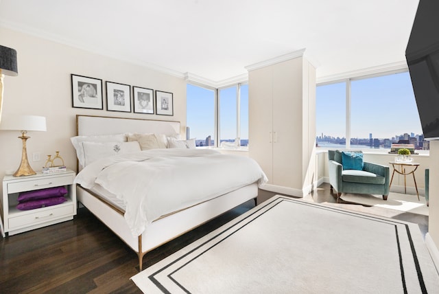 524 E 72nd St Unit 45Ab, New York City, NY 10021 - bedroom featuring dark wood-style flooring, ornamental molding, and baseboards