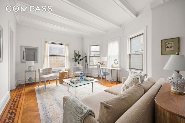 living room featuring baseboards and beam ceiling