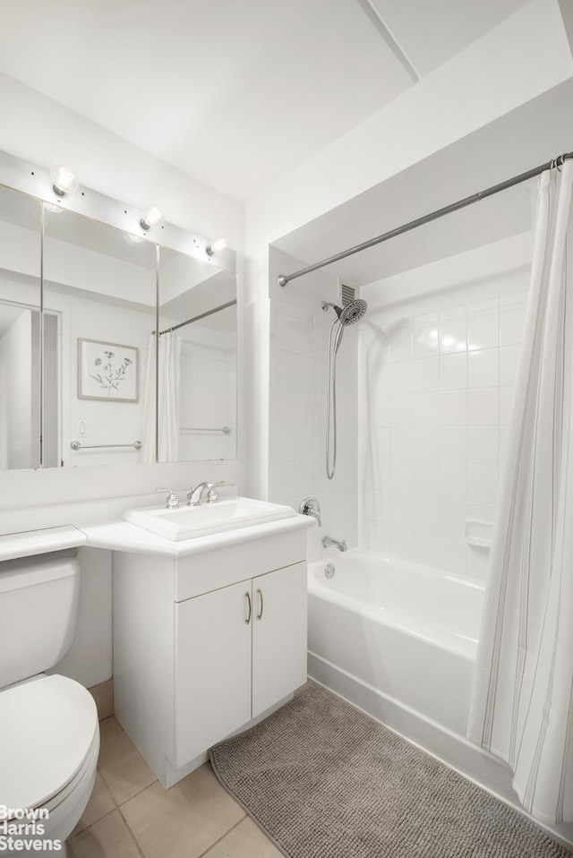 330 W 145th St Unit 505, New York City, NY 10039 - bathroom with shower / bath combo with shower curtain, vanity, toilet, and tile patterned flooring