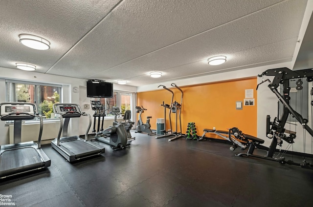 330 W 145th St Unit 505, New York City, NY 10039 - workout area with a textured ceiling