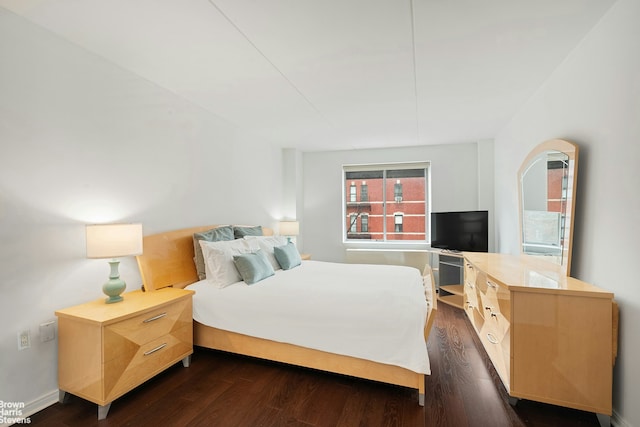 330 W 145th St Unit 505, New York City, NY 10039 - bedroom with dark wood-type flooring