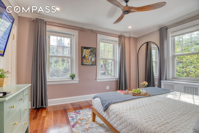 bedroom with recessed lighting, ornamental molding, baseboards, light wood-style flooring, and ceiling fan