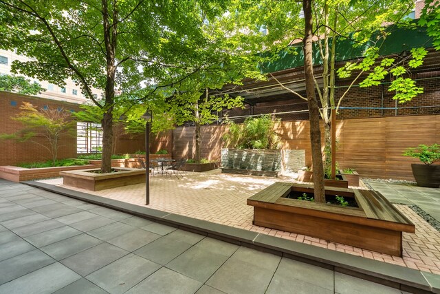 view of patio with fence