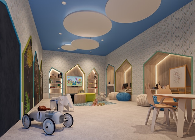 playroom with wallpapered walls, carpet flooring, and recessed lighting